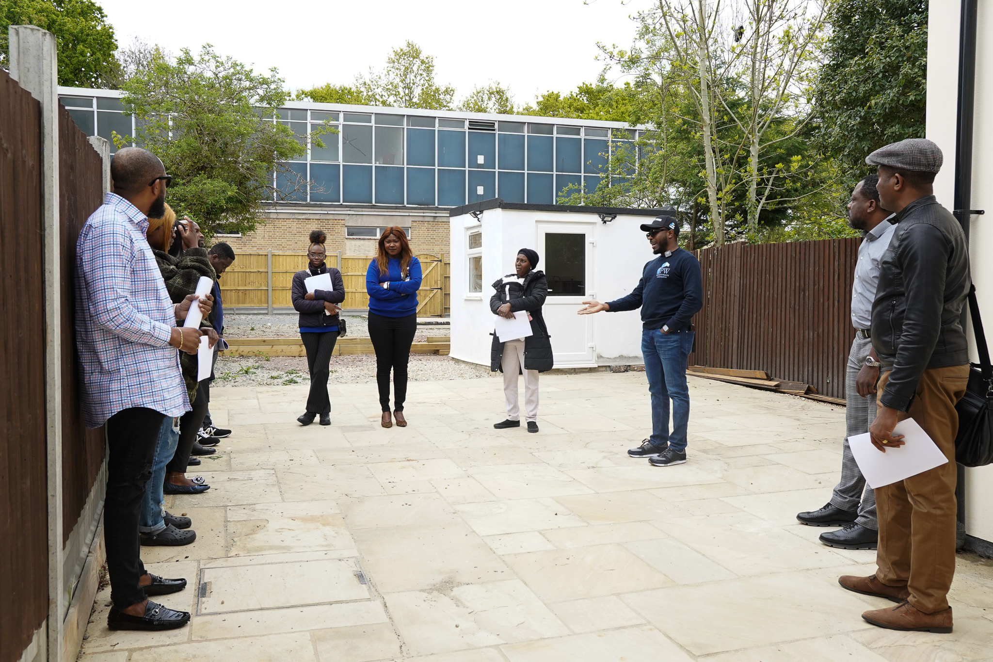 A Property Wealth Corporation group viewing a property together